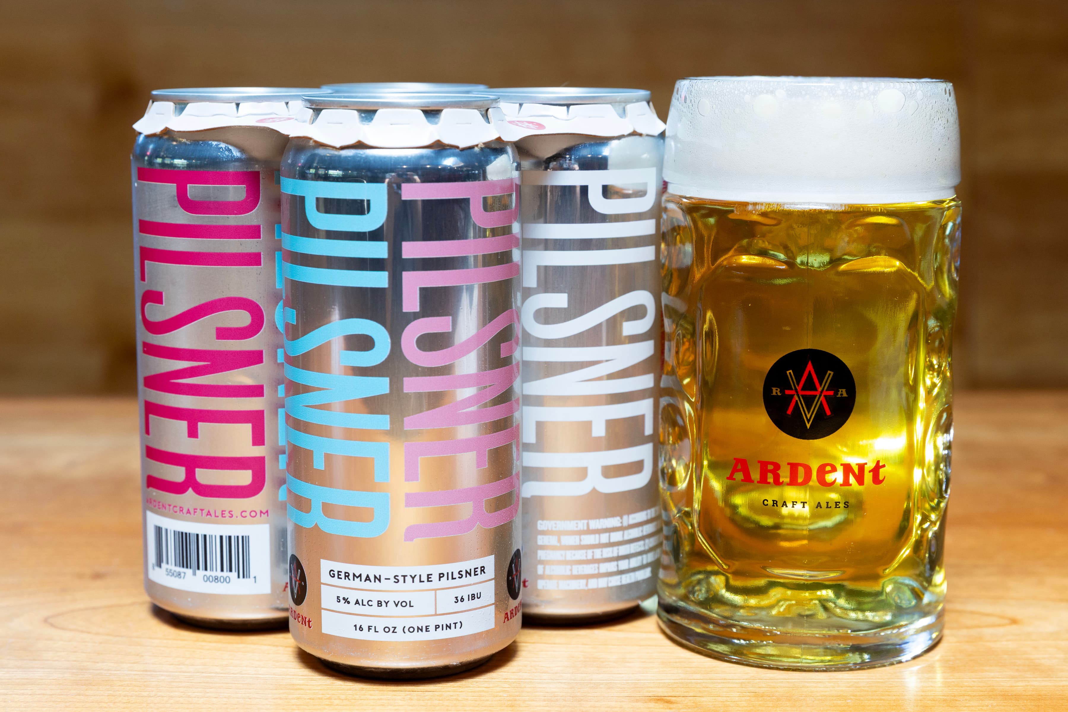 4-pack of 16oz cans and stein full of Pilsner